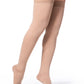 Woman wearing Sigvaris Essential Cotton compression thigh-highs in the color Light Beige