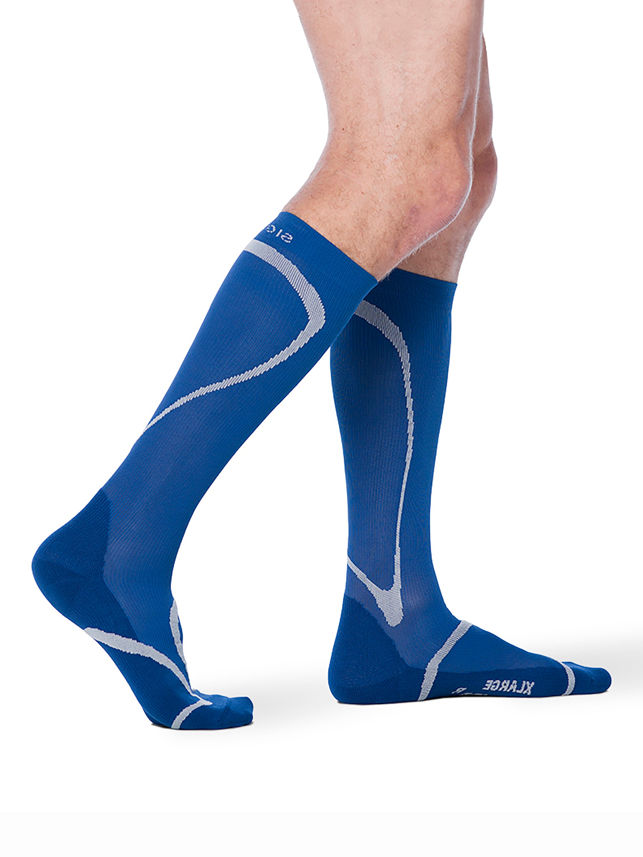 Man wearing Sigvaris Motion High Tech compression socks in the color Blue