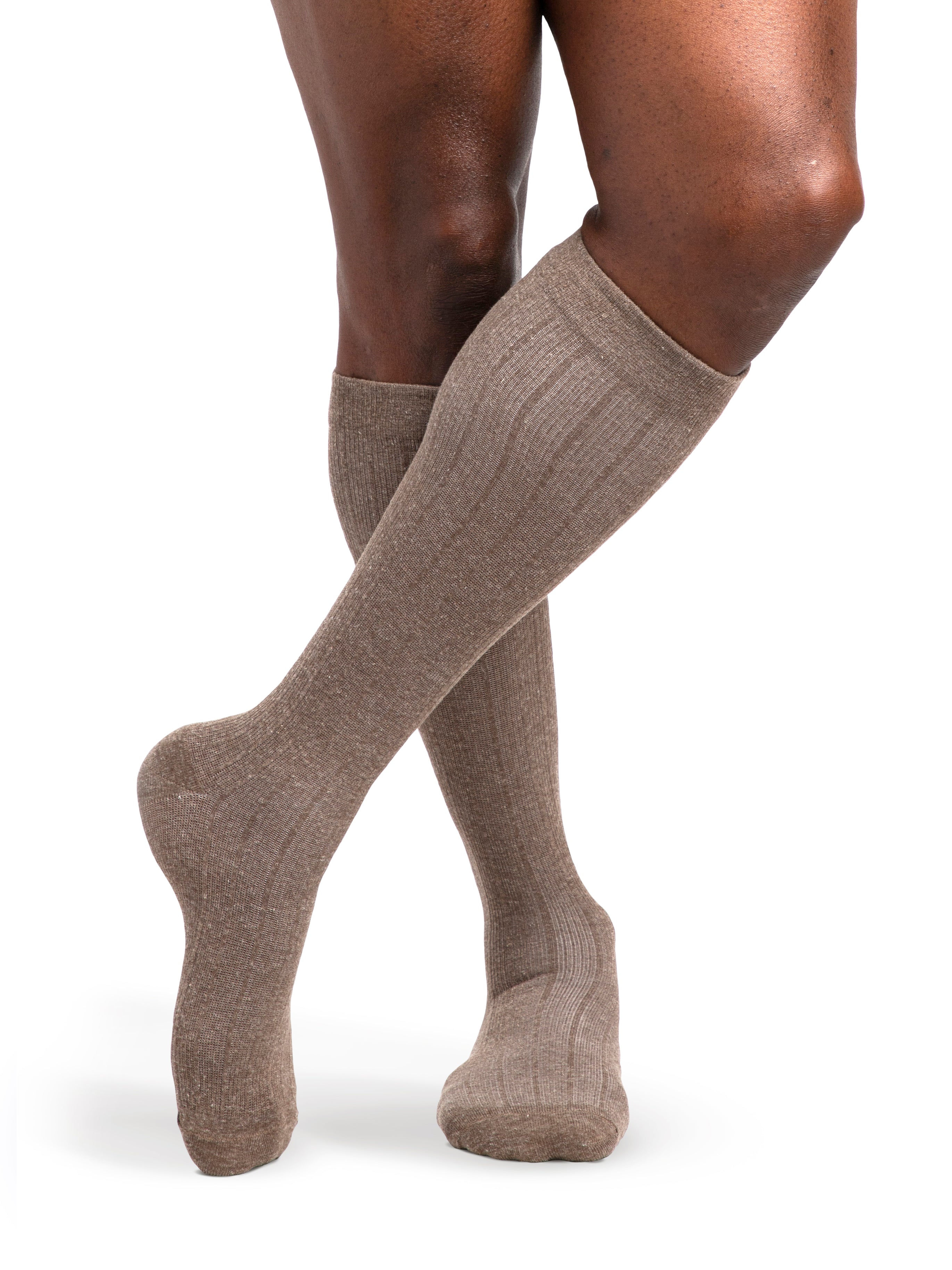 Man wearing Sigvaris Style Linen compression socks in the color Brown